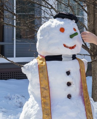 snowman dressed as a priest