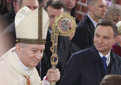 Parolin dressed in white