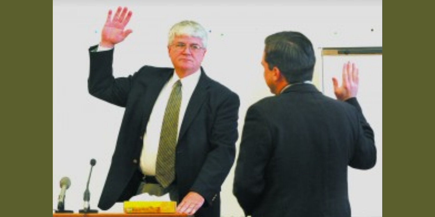 mclaughlin-taking-oath.jpg